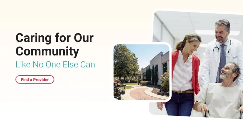 A healthcare professional and a patient are walking together outside a building, with trees and a path visible. Text reads, "Caring for Our Community Like No One Else Can," and "Find a Provider."