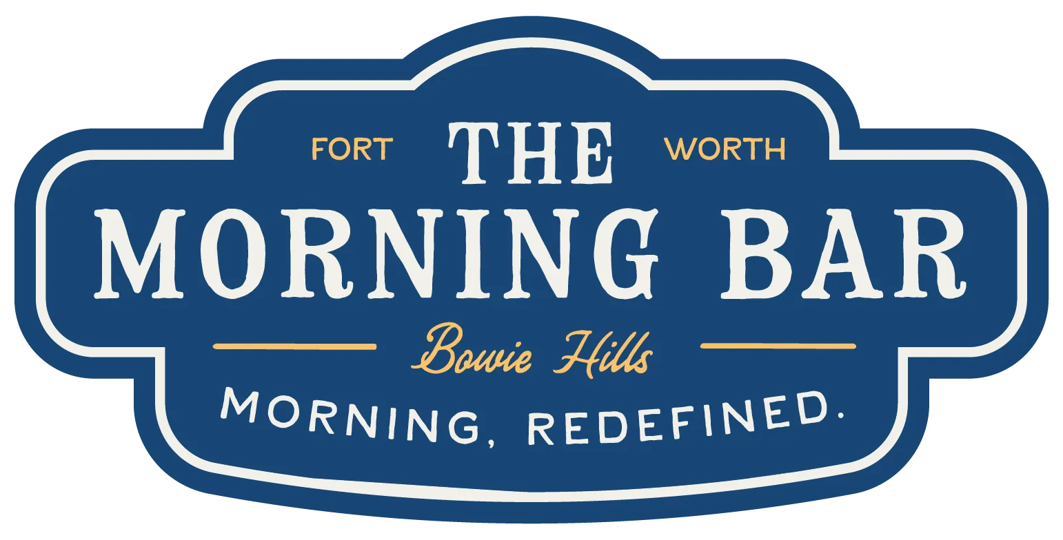 A sign for "The Morning Bar" located in Bowie Hills, Fort Worth. The sign features a blue background with white and gold text. The tagline reads, "Morning, Redefined."