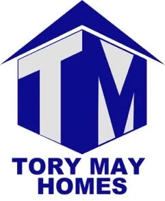 Logo featuring a blue and gray hexagon with a house silhouette, containing the letters "TM" and the text "TORY MAY HOMES" below in blue.